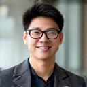 Portrait of David Chen, a tech professional in a casual setting.